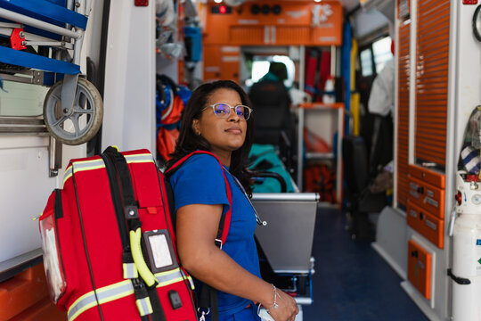 portrait of a female doctor working in an ambulance