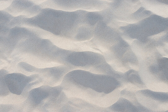 Background 0f White Sand with Footprints