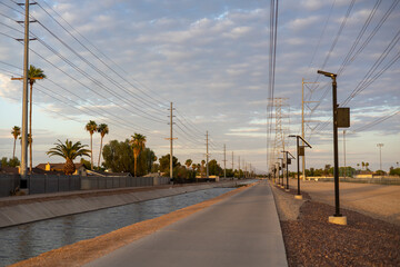 Chandler Arizona Canal at sunset powerlines and telephone poles in background