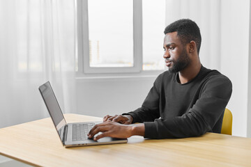 Fototapeta na wymiar freelancer man job computer office african student american education chat laptop online