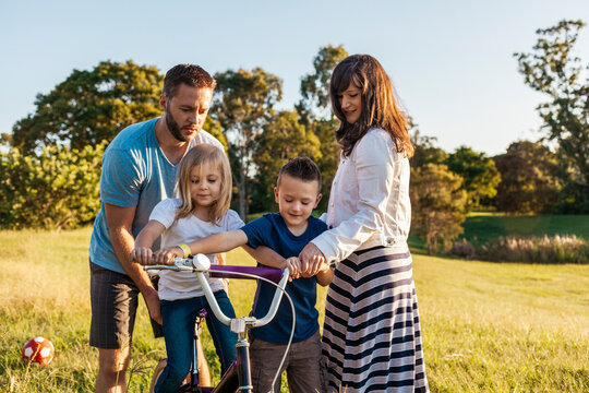 Young Family of 4 in a park