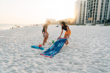 Tourist getting a spot on the beach. 