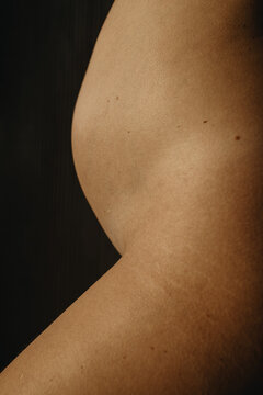 Close up Pregnancy Beauty in sunlight with flowers