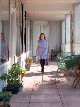 Tween Girl Arriving Home From School.