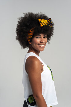 Studio shot of self-assured woman with afro 