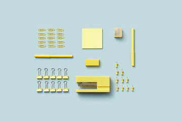 Stylish flat lay with various yellow stationery.
