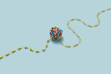 Cluster sphere on push pins and paper clips dotted line.