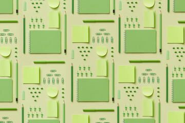 Pattern featuring stationery essentials in green colors.