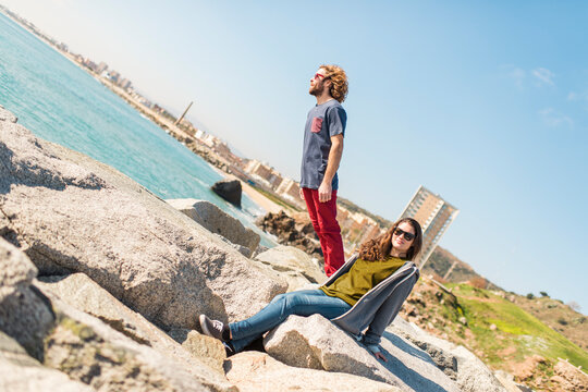 Happy couple surreal portrait near the sea