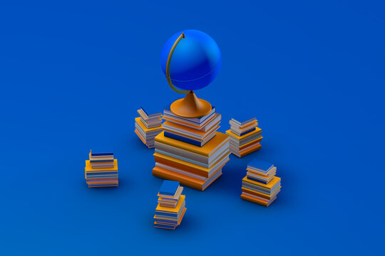 Blue globe sitting on top of a stack of book