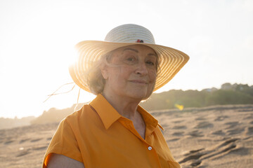 Retired woman at beach portrait