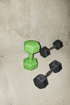 Sport equipment: dumbbells with raw direct hard flash