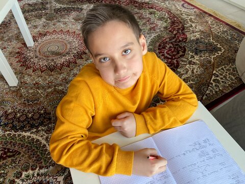 Young Student Doing Hard Math Problems