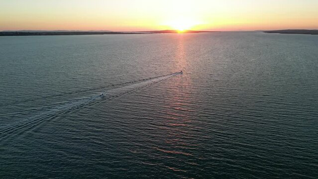 Sunset aerial panorama over Adriatic Sea with two boats in sight. Vrsi, Zadar region Croatia