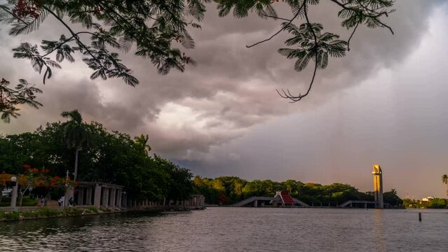 Timelapse at Villahermosa Tabasco Mexico Tomas Garrido Canabal Park La Venta Museum Ilusiones Lagoon during sunset storm clouds