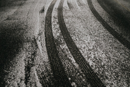 Tire Tracks in Snowy Road
