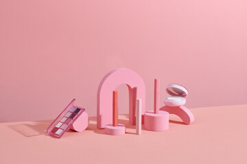 Set decorative cosmetics on pink background.