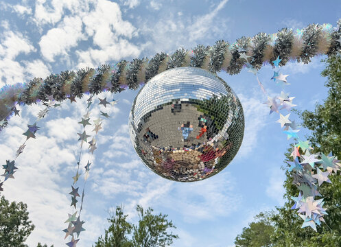  Spinning  disco ball abstract on parade float outdoors  with nobody