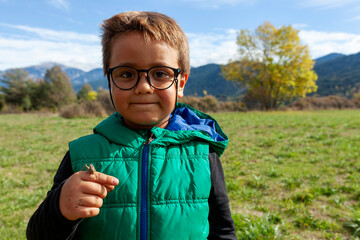 cute young boy with glasses 