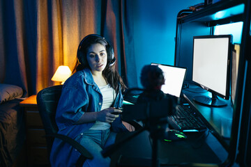 Gamer playing video games and streaming it online