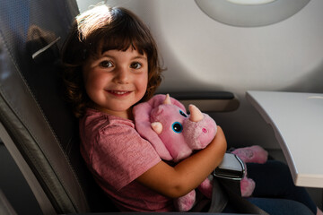Kid traveling on the plane
