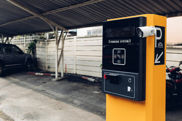 Car park automatic entry system. Security system for building access - barrier gate stop with toll booth, Security CCTV camera