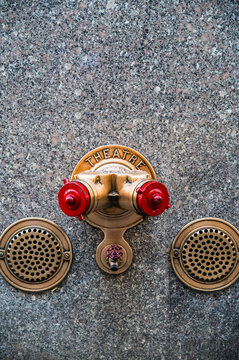 Fire hydrant on wall in city
