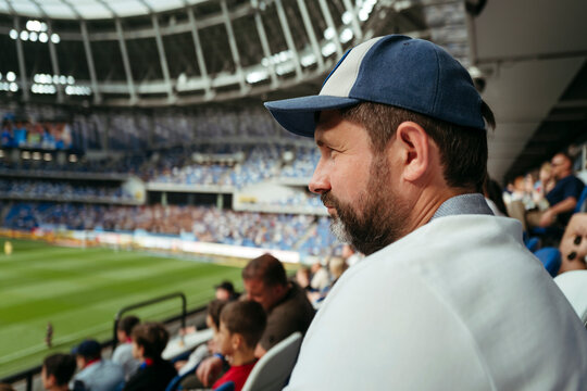 Male fan at football match.