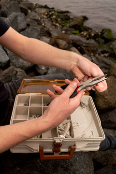 Fisherman Preparing Fishing Line 