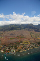 Aerial view of the harbor and Front Street Lahaina as shot from a helicopter over the historic town of Lahaina Maui Hawaii