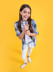 photo of smiling teen girl karaoke singer with microphone. teen girl karaoke singer