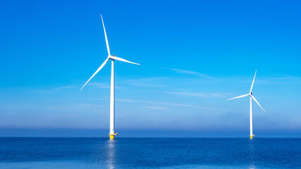 Windmill park with clouds and a blue sky, windmill park in the ocean aerial view with wind turbine...
