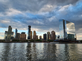 Obraz premium Jersey City, USA - May 05, 2023: cityscape view with skyscraper building architecture in skyline of jersey city