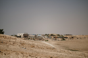 A dirt road leads to a remote Bedouin village in the Negev Desert of southern Israel.