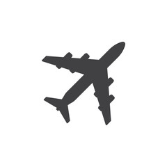 Silhouette of an airplane flying in the sky