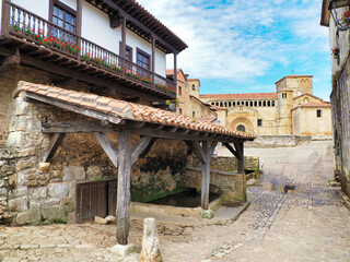 beautiful photo of santillana del mar with the collegiate church in the background