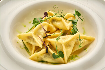 delicious dumplings in a deep dish