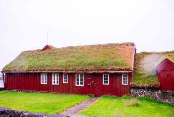 Traditional Wooden House  in Faroe Isles with grass roof - 636185989