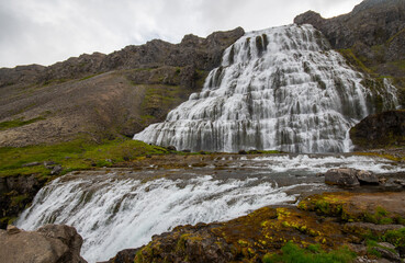 Dynjandi waterfall Iceland with dramatic foreground - 636189534
