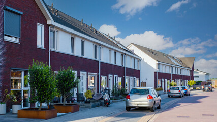 Dutch Suburban area with modern family houses, newly build modern houses in a row