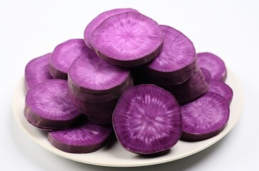 Obraz na płótnie Canvas Sweet purple potatoes in plate