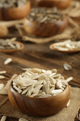 DRİED NUTS AND FRUİTS IN WOODEN BOWL ON BROWN FLOOR