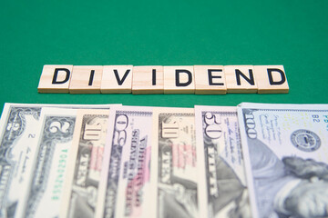 The inscription Dividend next to American dollars. The dividend is a distribution of profits by a corporation to its shareholders.