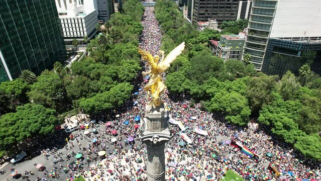 orbital aerial drone shot of angel of independence during pride parade 2023 in mexico