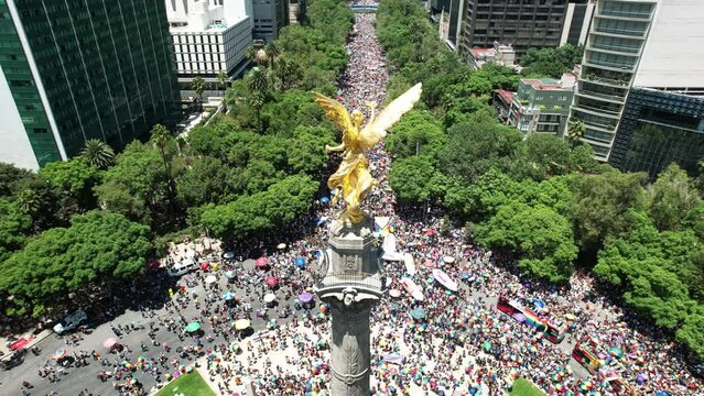 orbital aerial drone shot of angel de la independencia in mexico city during pride parade june 2023