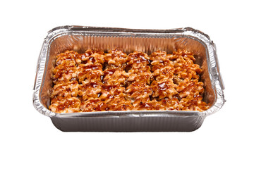 Baked hot sushi rolls in a baking dish isolated on a white