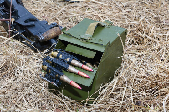 machine gun belt in a green storage box