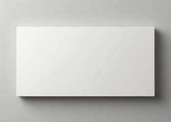 white sheet of paper on an grey wall