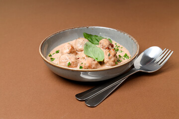 Tasty meat food and homemade food concept - meatballs