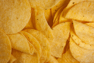 Chips close-up, fast food, background and textures, advertising